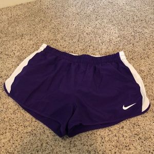 Nike dry fit women’s running shorts. Size large. Purple.